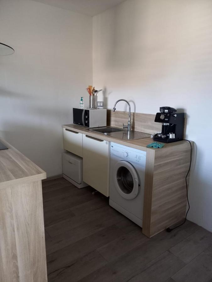 Afa Butrone Sarrola Apartment ภายนอก รูปภาพ